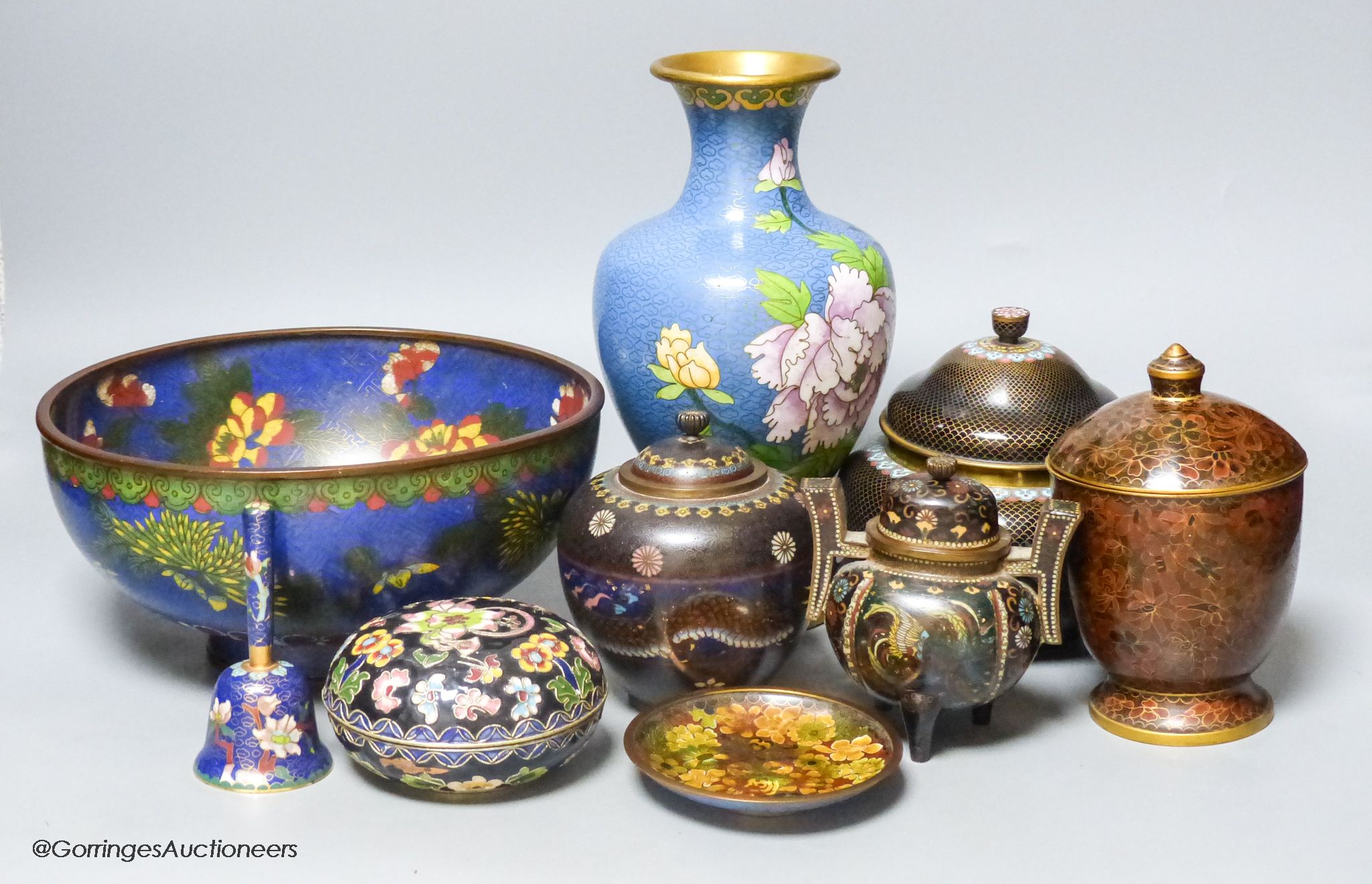 A Chinese cloisonne enamel bowl and a similar jar and cover, early 20th century, a box and cover, jar and cover, a dish and two Japanese cloisonne vessels